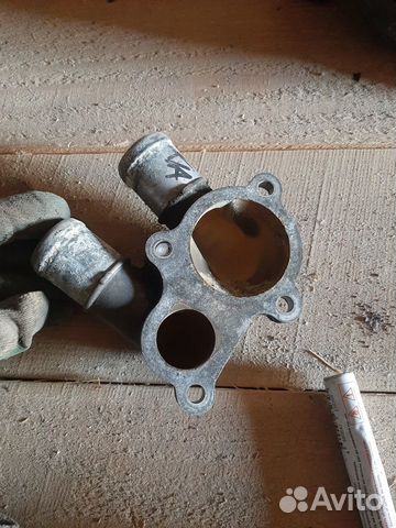 Корпус термостата на Кия Церато,Kia Cerato 1