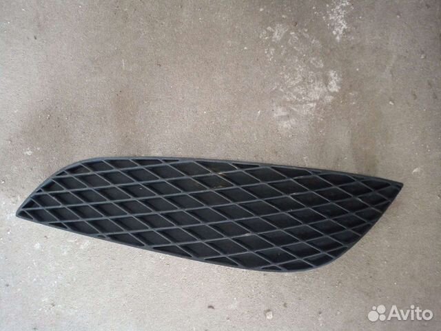 Заглушка противотуманки Опель Астра h рестаил