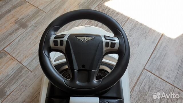 Машинка-каталка музыкальная