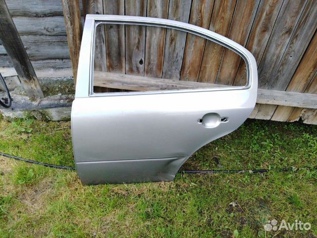 Задняя левая дверь Skoda octavia tour