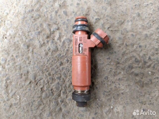 Форсунка инжекторная электрическая Mazda Demio 1.3