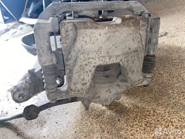 Суппорт тормозной передний левый Chevrolet Cruze