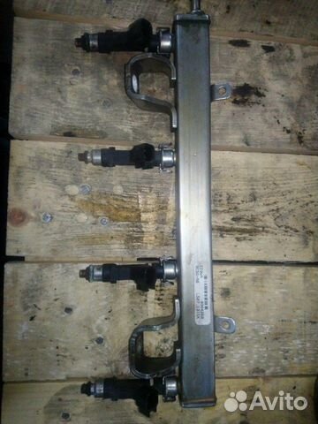 Топливная рампа с форсунками Ford 9e5g-ab