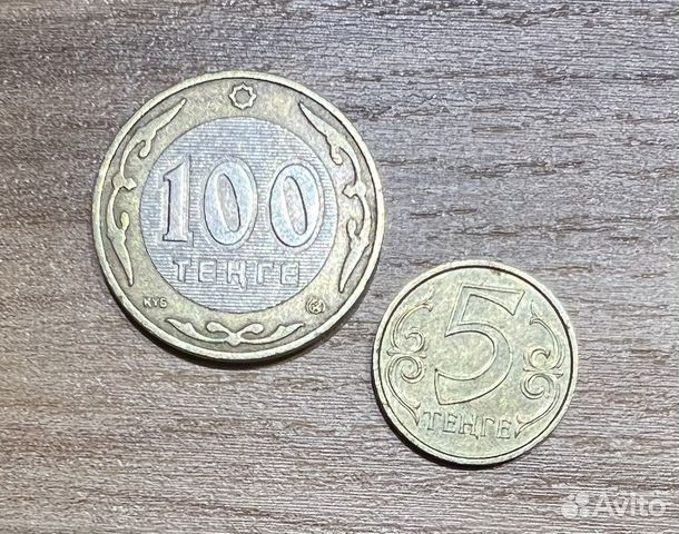 Монеты 100 тенге и 5 тенге Казахстан