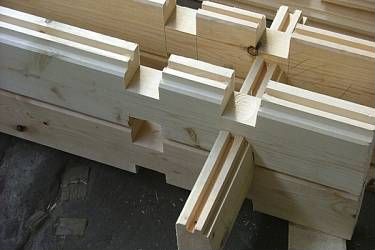 Дом из досок на ребро