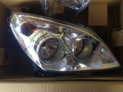 Фара левая Opel Astra H