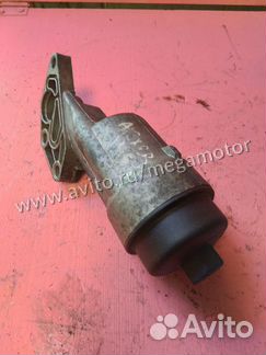 Корпус масляного фильтра Opel A12XER 55560748
