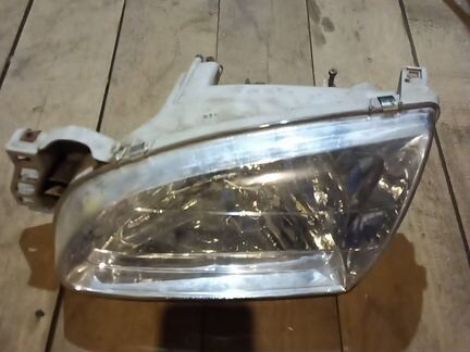 Фара левая Киа Авелла